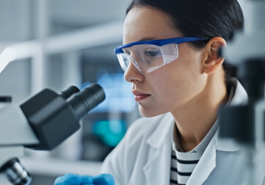 Firefly-A-laboratory-technician-in-a-white-coat-carefully-examining-a-sample-with-high-tech-equipmen